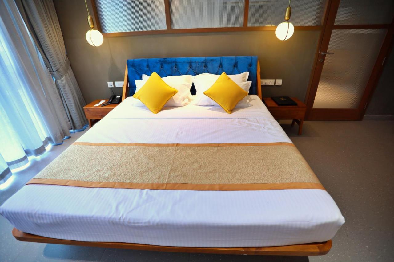 E.05 City Inn Alwaye Экстерьер фото